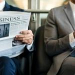 Business Men Break Sit Read Newspaper